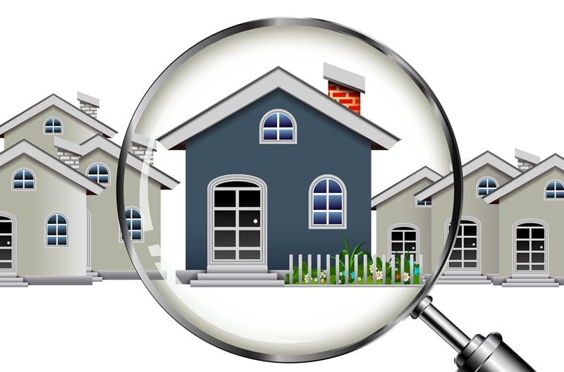house with magnifying glass