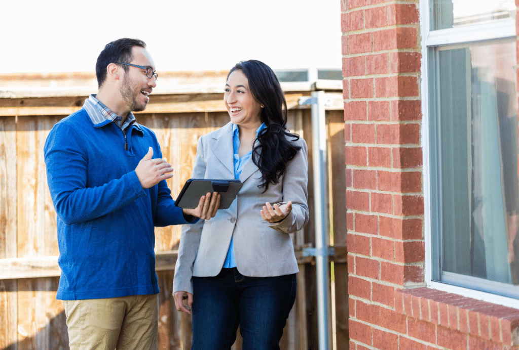 home inspector speaking with home owner