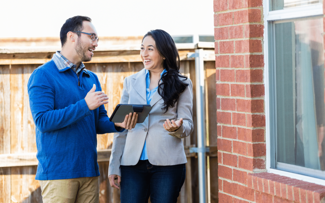 home inspector speaking with home owner