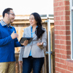 home inspector speaking with home owner