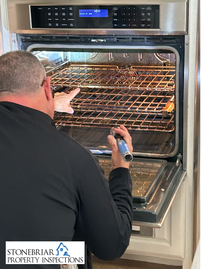 Stonebriar Property Inspections inspector checking oven