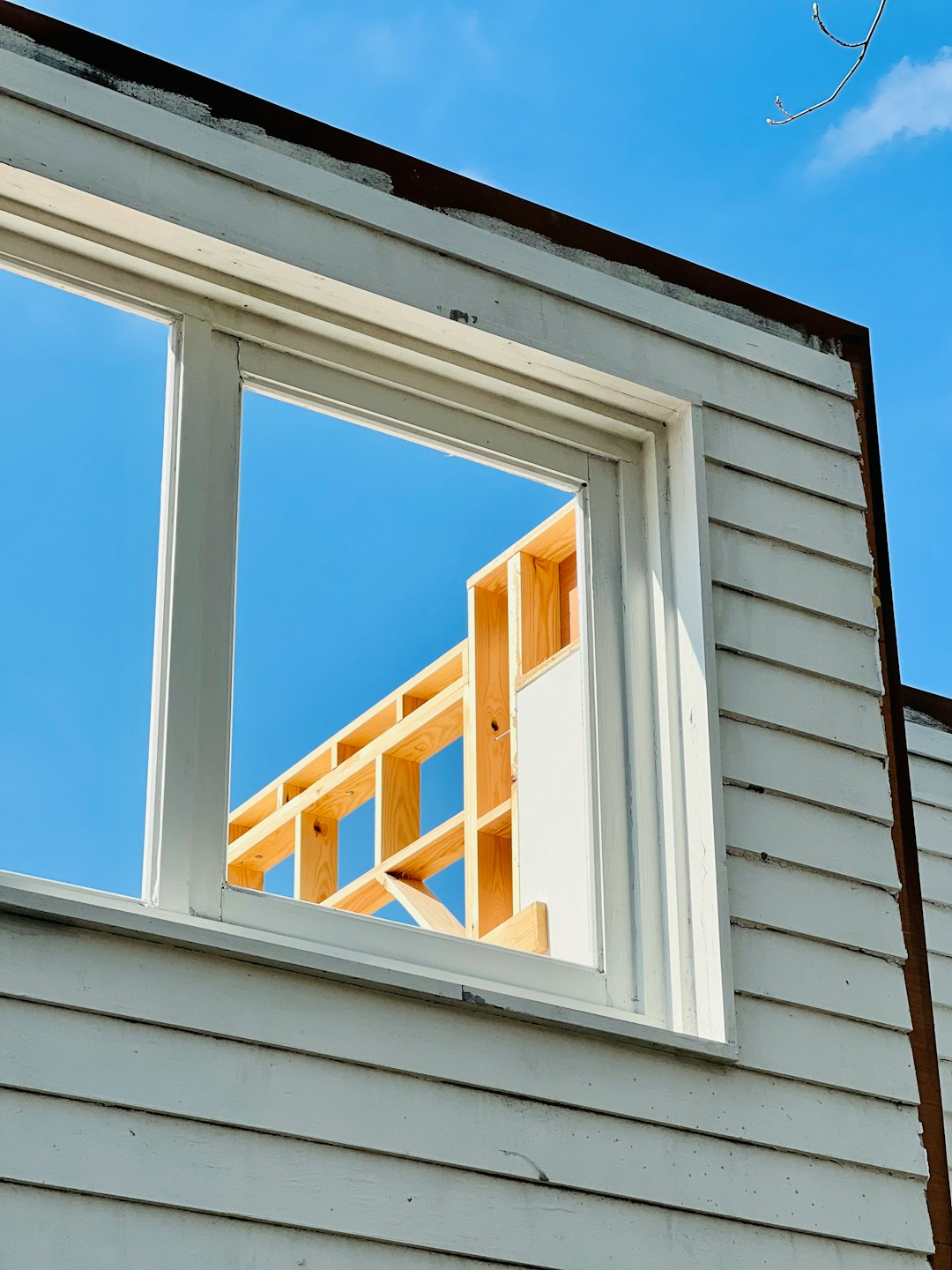 Photo by Stephanie Klepacki a picture of a window with a wooden frame
